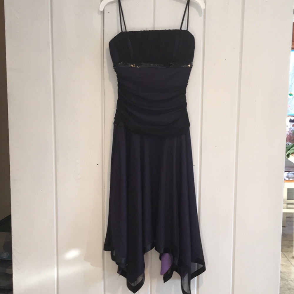 Black sheer over purple dress